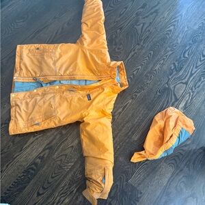 Patagonia Kids Orange Puffer Jacket with Blue Lining